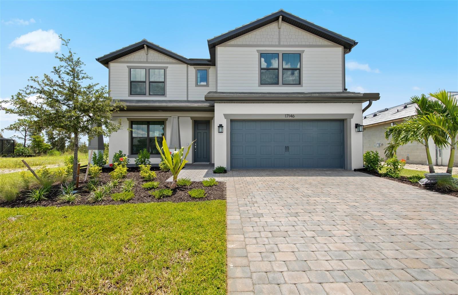 New construction home! Located in the gated community of Lakespur within the award-winning master-planned development of Wellen Park, this stunning home features the spacious Whitestone floorplan, offering 5 bedrooms, 4 bathrooms, and a versatile loft—perfect for additional living space, a media room, or a play area. Designed with comfort and modern style in mind, the home boasts an oversized garage, a tray ceiling in the gathering room, quartz countertops, under cabinet lighting, and kitchen pendant prewiring for a custom lighting design. The primary bathroom includes an extended tile shower wall to the ceiling and a sleek heavy glass shower door. Additional upgrades include 8-foot interior doors, strategically placed floor outlets, and elegant 5" baseboards throughout. With only 68 future residences, Lakespur offers an intimate, community-focused lifestyle enhanced by exceptional amenities. Residents enjoy access to a resort-style pool, a cozy fire pit lounge, a playground, and a beautifully maintained event lawn for neighborhood gatherings. A fenced-in dog park and a 12-foot-wide paved walking trail provide the perfect setting for outdoor enjoyment and active living. Set in the heart of Wellen Park, this home offers easy access to a thriving area full of dining, shopping, and entertainment options. Experience the best of Florida living in this thoughtfully designed home in Lakespur at Wellen Park.