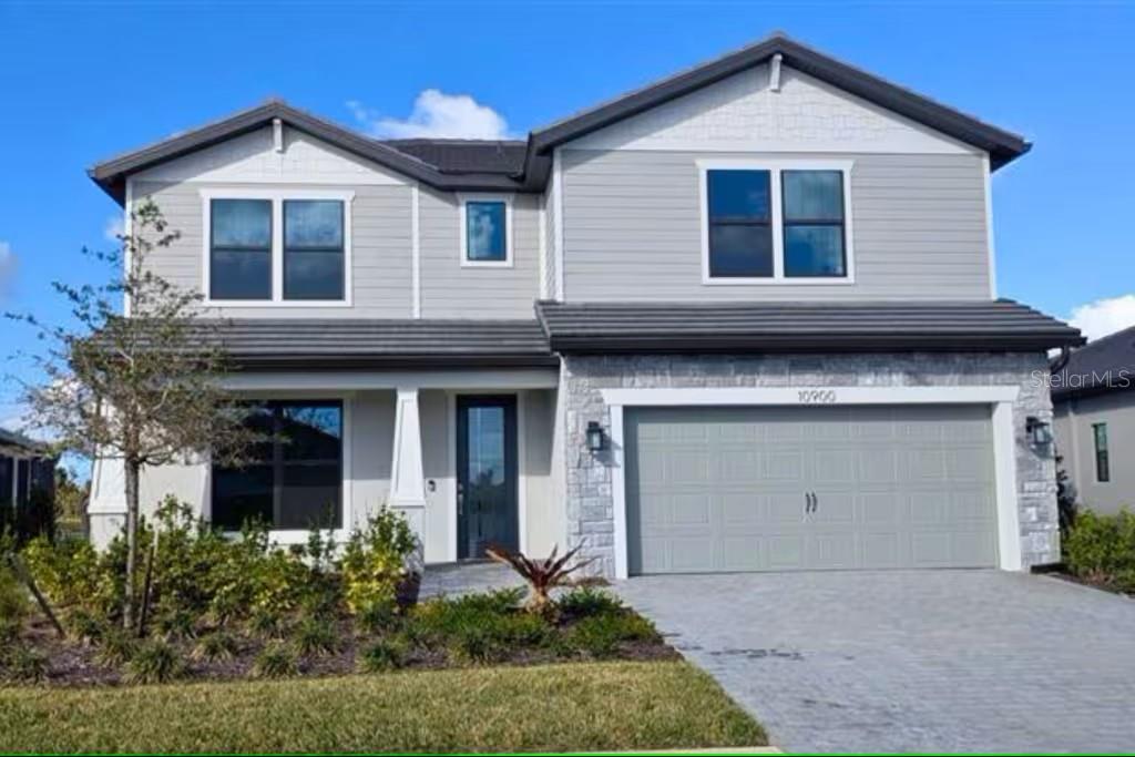 New construction home! Located in the gated community of Lakespur within the award-winning master-planned development of Wellen Park, this stunning home features the spacious Whitestone floorplan, offering 5 bedrooms, 4 bathrooms, and a versatile loft—perfect for additional living space, a media room, or a play area. Designed with comfort and modern style in mind, the home boasts an oversized garage, a tray ceiling in the gathering room, quartz countertops, under cabinet lighting, and kitchen pendant prewiring for a custom lighting design. The primary bathroom includes an extended tile shower wall to the ceiling and a sleek heavy glass shower door. Additional upgrades include 8-foot interior doors, strategically placed floor outlets, and elegant 5" baseboards throughout. With only 68 future residences, Lakespur offers an intimate, community-focused lifestyle enhanced by exceptional amenities. Residents enjoy access to a resort-style pool, a cozy fire pit lounge, a playground, and a beautifully maintained event lawn for neighborhood gatherings. A fenced-in dog park and a 12-foot-wide paved walking trail provide the perfect setting for outdoor enjoyment and active living. Set in the heart of Wellen Park, this home offers easy access to a thriving area full of dining, shopping, and entertainment options. Experience the best of Florida living in this thoughtfully designed home in Lakespur at Wellen Park.