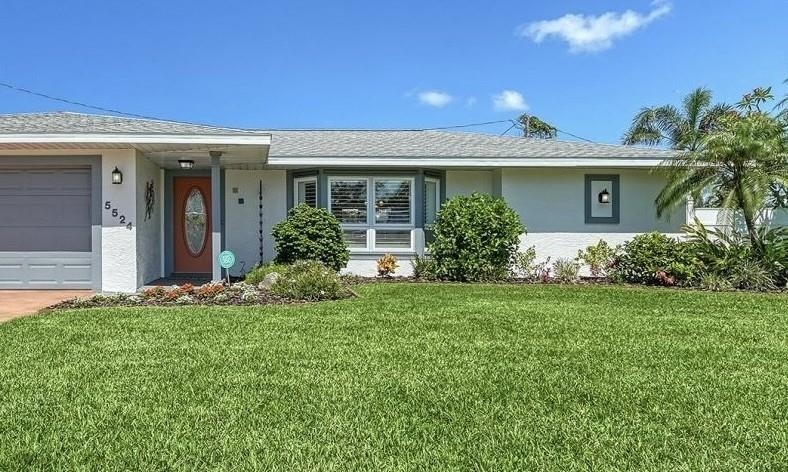 PRICE IMPROVEMENT on this beautifully updated, well-maintained, three bed, two bath pool home in desirable Phillippi Gardens. Nestled on a quiet and spacious lot, close to beaches, Gulf Gate shopping, and the vibrancy of downtown Sarasota. World famous Siesta Key, with it's sugar sands and azure waters, is just 2 miles away! Enjoy gentle Gulf breezes and pastel sunsets in your private back yard oasis, complete with a covered and screened lanai, solar-heated pool, and lighted tropical gardens. An extended two-car garage and fenced back yard, complete with paver pad and storage shed, provide ample storage options. NO HOA or CDD...Bring your RV, boat, or vacation rental dreams! A new strapped roof in 2023 and new HVAC in 2025 protect your investment for years to come. Inside, you'll find a split floor plan with updates in every room, including a kitchen featuring a gas stove, pantry, and custom 14" cabinets with granite counters and backsplash. The primary bedroom offers direct access to the lanai and a renovated bathroom. The third bedroom doubles as an office with two built-in desks and cabinets, ideal for remote work. Feel safe at home protected by an EMG/Alert 360 security system, a fresh water 170-foot deep well, reinforced garage door, and a generator port to power the entire house during outages. Public sewer connected in 2019 and new electric service (with a 200-amp panel) in 2022. Recently painted inside and out. This wonderful home is NOT in a flood zone and had NO water intrusion during the 2024 storm season. Embrace the coastal lifestyle or capitalize on the great vacation rental market with this MOVE IN READY home. Schedule a tour today!