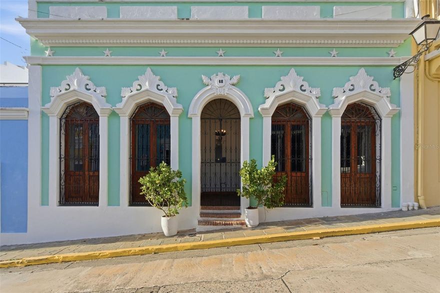 Charming three-story historic residence at 65 Calle San Francisco in Old San Juan, blending timeless colonial character with modern comforts. Originally built in 1850 and renovated in 2010, this home offers 4 bedrooms and 5 bathrooms thoughtfully distributed across three floors, providing both privacy and inviting gathering spaces. At the heart of the residence is a serene interior patio, complemented by a spacious terrace and private rooftop, ideal for relaxing or entertaining while enjoying Caribbean breezes and historic surroundings. Located just steps from plazas, galleries, restaurants, and the waterfront, this property captures the unique rhythm of Old San Juan living while offering rare space and comfort.