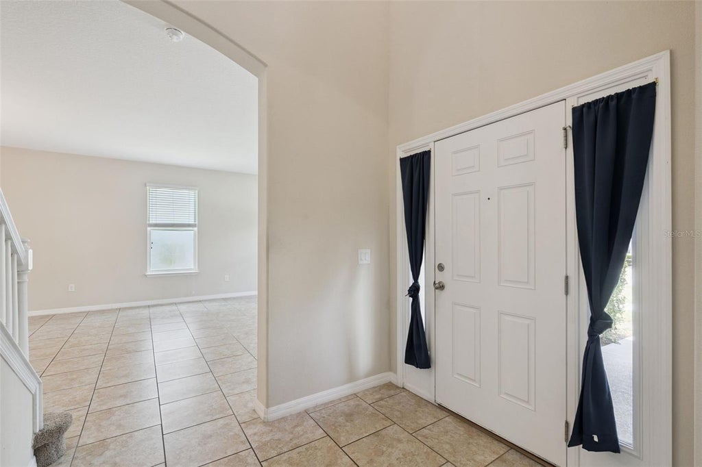 Photo of 2230 J Lawson Boulevard, Orlando, FL 32824 (MLS # O6436588)