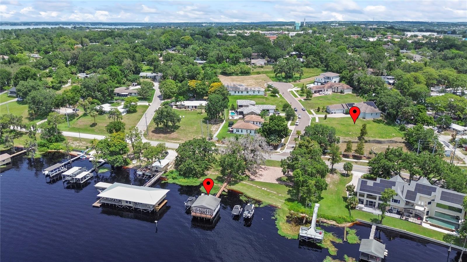 Welcome Home to The Moorings! Beautiful CORNER lot with stunning views of Lake Minnehaha on Clermonts Chain of Lakes. This is a once- in-a- lifetime opportunity to build the home of your dreams in one of the most desirable locations in Central FL. This community has a private Boathouse so you can enjoy your boat and all that makes lake living so fun. Put in your own boat lift at the boathouse to access the Chain of Lakes. This lot has an unobstructed view of the lake. Imagine enjoying coffee in the morning or a glass of wine in the evening while you take in the gorgeous sunrises and sunsets from the privacy of your balcony. This beautiful lot is located in the heart of Clermont and convenient to shopping, dining and, of course, all of the theme parks in Central Florida. Don't miss the opportunity to own this piece of paradise! Come bring your builder and see for yourself the luxurious lifestyle that awaits YOU!