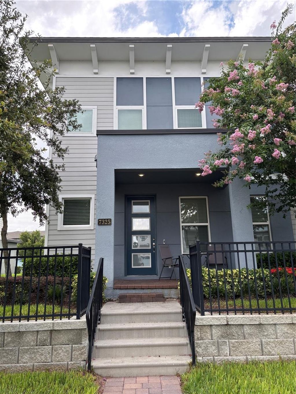 Photo of 7325 Alpine Butterfly Lane, Orlando, FL 32819 (MLS # O6349730)