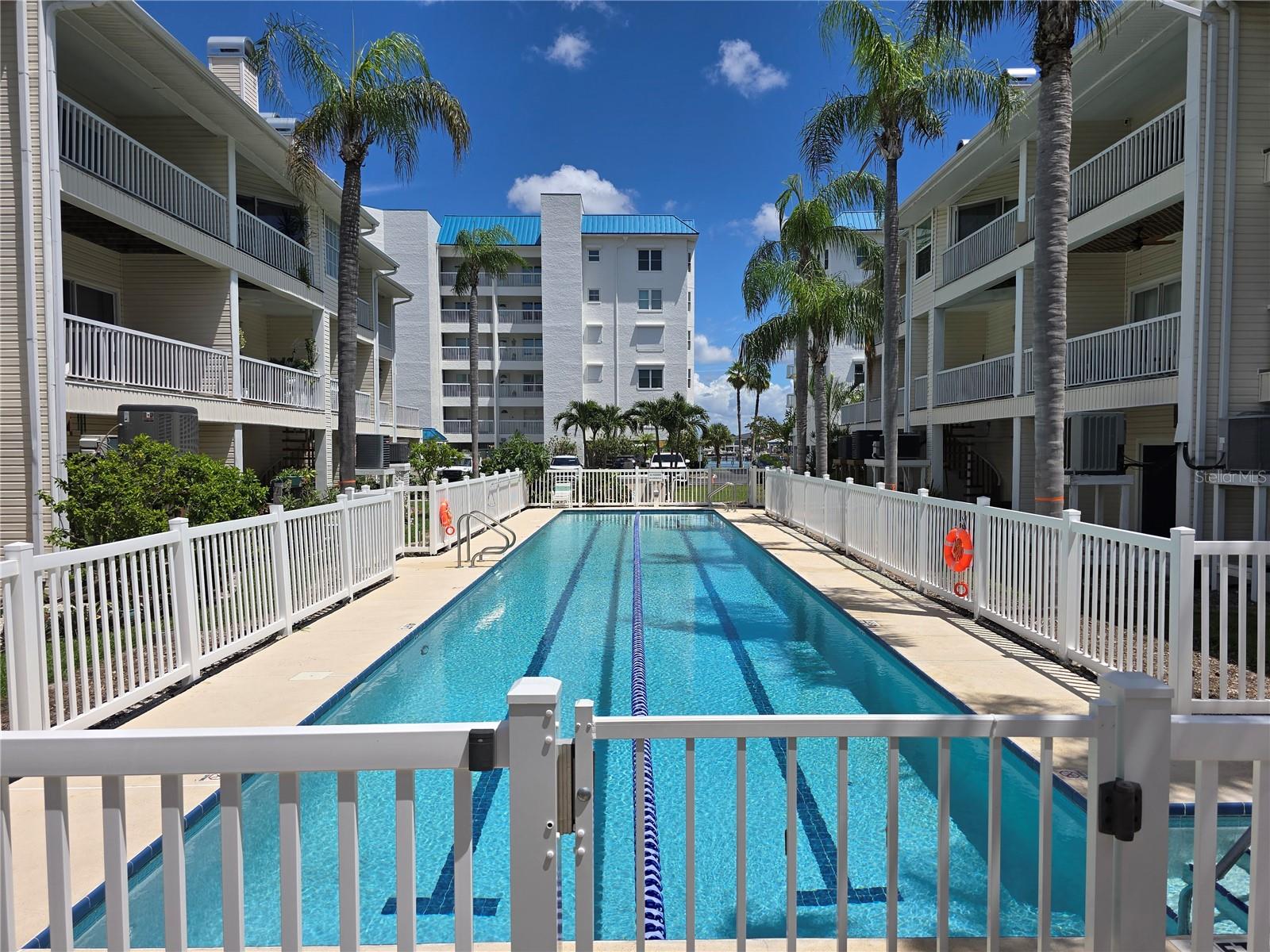FURNISHED ANNUAL RENTAL WITH DEEDED BOAT SLIP, LOCATED A FEW BLOCKS FROM TREASURE ISLAND BEACH!
This lovely and furnished three-bedroom, three-bath Key West-style townhome offers an interior elevator and 2-4 car garage, and deeded boat slip with direct intracoastal access. All located a few blocks from Treasure Island Beach! Water/sewer, trash, Basic Cable TV, and wifi included in rent.
Wrap-around porches, balconies, and shaded outdoor spaces, capture the Florida tropical lifestyle! Inside, modern updates include light neutral paint, luxury vinyl flooring, plantation shutters, and impact glass windows.
The second-floor main living area features an open plan with a corner fireplace, dining area with sunset vistas, and a bright kitchen with white shaker cabinets, quartz countertops, stainless appliances, breakfast bar, pantry, and ample storage. Also on this level: a guest suite with updated bath and water view.
Upstairs, the primary suite includes a walk-in closet, private balcony, and spa-style bath with soaking tub, glass shower, double vanity, and linen storage. A second guest suite has an ensuite bath, balcony, and sunrise/sunset views.
The 1,100+ SF first level offers garage parking, storage, covered patio, and a lanai with spiral staircase to the main porch.
Community amenities include a waterfront clubhouse with pool and spa, marina, beach area, fitness center, and lap pool. Nearby parks offer baseball, tennis, pickleball, dog parks, kayak/paddleboard launches, and a boat ramp. Centrally located between Treasure Island and St. Pete Beach, Captiva Cay is the perfect coastal retreat.
This one is a must see! Grab your favorite agent and ask for a showing!