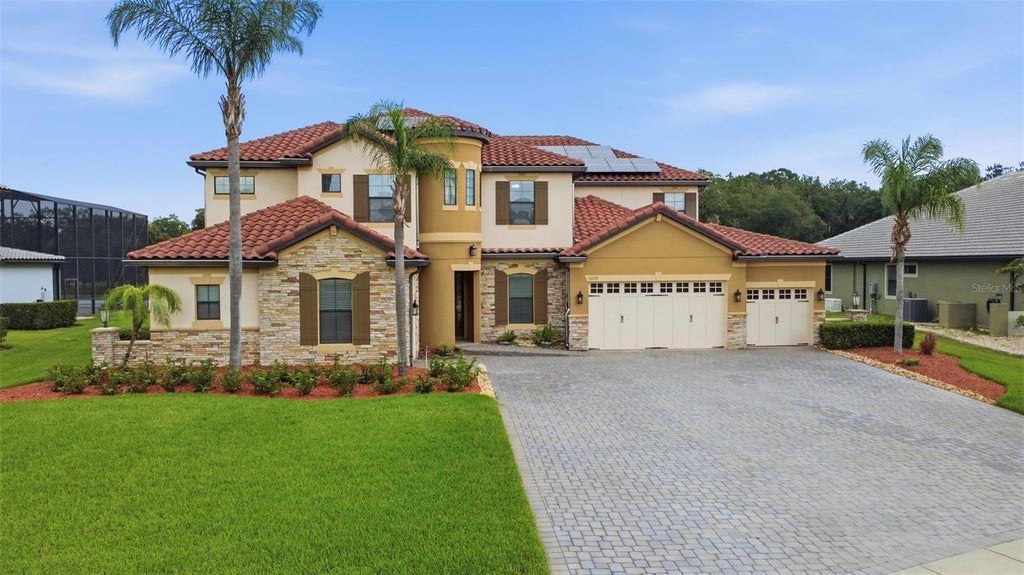 Photo of 5229 Waterside Vista Lane, Saint Cloud, FL 34771 (MLS # O6429142)