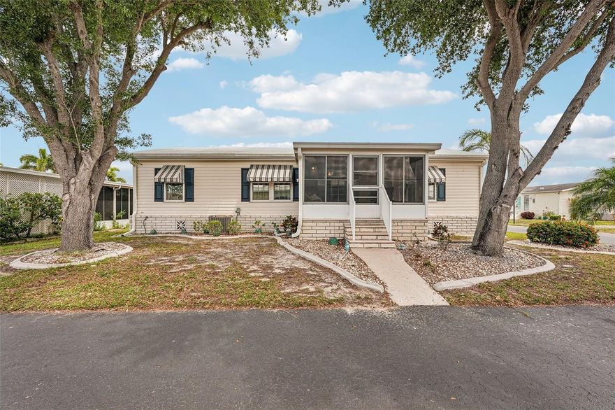 Turnkey & Fully Furnished! Your Slice of Paradise Awaits in Port Charlotte Village!
Picture yourself living in this stunning 3-bedroom, 2-bathroom home, nestled in the peaceful, resident-owned Port Charlotte Village—a welcoming 55+ community of fewer than 500 homes where neighbors truly feel like family.
Built in 2005 and meticulously remodeled, this corner-lot gem perfectly blends modern elegance with comfortable Florida living. Step inside to beautiful water-resistant laminate flooring that flows throughout the bright, open-concept living areas beneath soaring cathedral ceilings. The gourmet kitchen impresses with brand-new granite countertops and stainless steel appliances, while the spa-like bathrooms deliver everyday luxury.
This home is truly move-in ready: fully furnished with brand-new mattresses, a stackable washer/dryer, and thoughtful partial furnishings already in place. No need to haul furniture—just unpack and start enjoying retirement!
Relax on the enclosed front porch lanai with peaceful water views at the end of your street, or enjoy the gentle Florida breeze under the attached 2-car carport. Recent upgrades include a brand-new A/C system, updated electrical, advanced surge protection, and fresh windows for maximum comfort and peace of mind.
Located in one of Charlotte County’s top-rated 55+ communities with low HOA fees, a pool, clubhouse, and vibrant social scene—all just minutes from shopping, dining, boating, and Gulf beaches.
Don’t miss your chance to own this slice of paradise!
Schedule your private showing today and make this dream home yours. Call or text now for details!