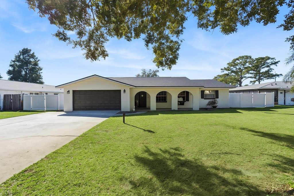 Photo of 27922 Tammi Drive, Tavares, FL 32778 (MLS # O6352517)