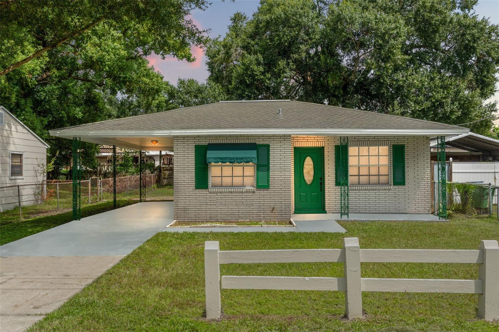 READY IMMEDIATELY. Welcome Home. This 3bedroom, 2bath mid-century brick construction home is Centrally Located near Historic West Tampa. Enjoy the convenience of being SO CLOSE to Booming MidTown, Raymond James Stadium, Downtown Tampa, Airport and Tampa Riverwalk. This lovely long-term rental property is ready to call home. You'll LOVE the wood cabinets, stainless appliances, granite stone counter tops and brand-new paint inside and out. The large living room is ready for your family gatherings. The covered carport, large driveway and big yard space are excellent amenities. All 3-bedrooms are good sizes and the bathrooms are newly updated. Washer Dryer Hookups are in the laundry room. The backyard is is a great size or relax on the covered front porch. Fresh Paint and new bathrooms. No Flood Zone. Tours available today!