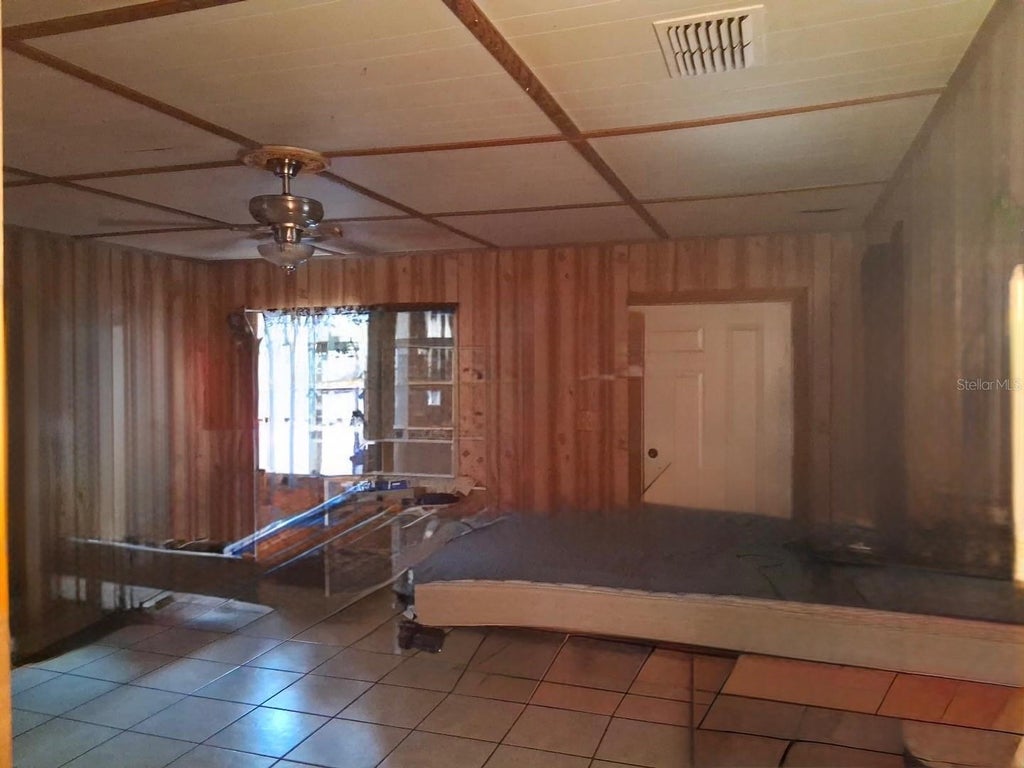 Photo of 320 W Terrace Avenue, Lake Alfred, FL 33850 (MLS # TB8554118)