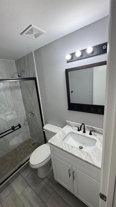 Tiny photo for 1017 Beecher Street, Leesburg, FL 34748 (MLS # O6353701)