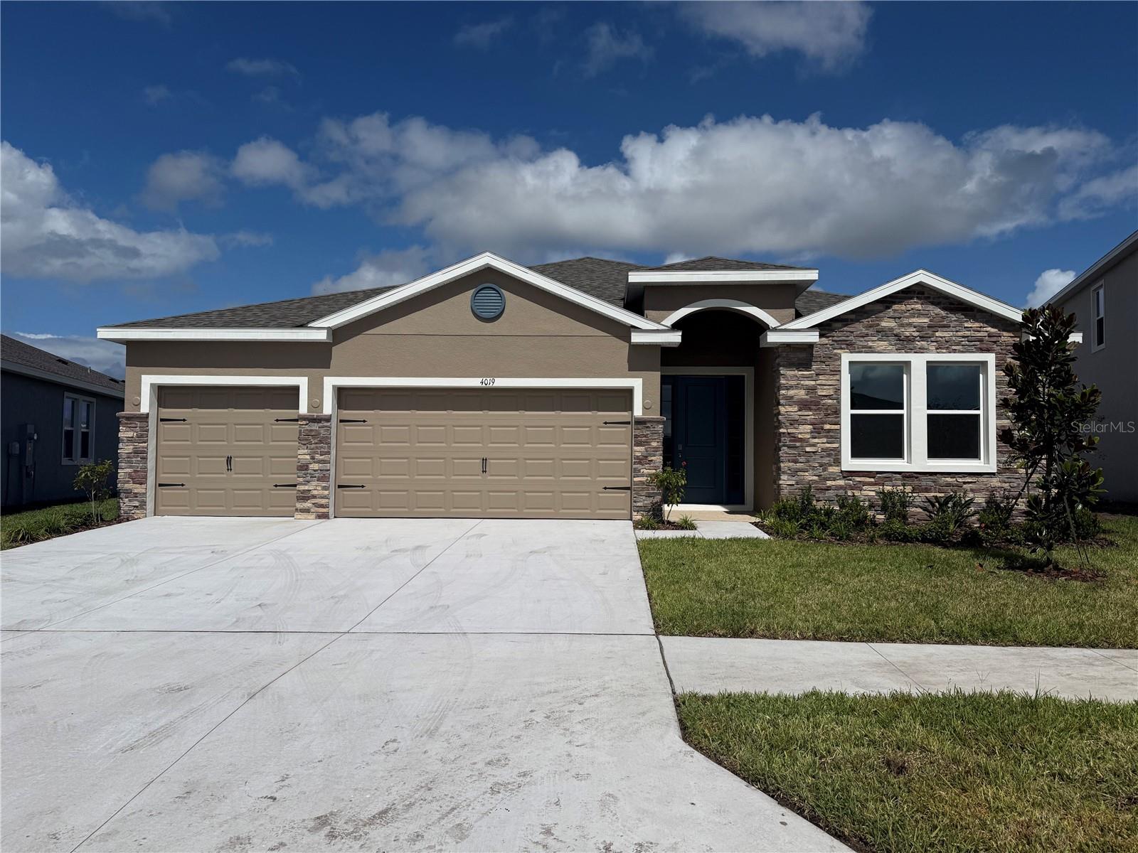 Welcome to this brand-new 2025 single-family home located in the highly desirable Farm at Varrea community in Plant City, FL. This stunning residence offers 4 bedrooms, 3 bathrooms, and approximately 2,537 sq. ft. of modern living space designed for comfort, style, and functionality. Step inside to discover a bright open-concept layout that seamlessly connects the living, dining, and kitchen areas—perfect for both relaxing and entertaining. The gourmet kitchen features stainless steel appliances, quartz countertops, a spacious island, and ample cabinetry. The primary suite includes a walk-in closet and a luxurious ensuite bath with dual vanities and a glass-enclosed shower. Additional highlights include a three-car garage, washer and dryer, generous storage, and elegant finishes throughout. Residents of The Farm at Varea enjoy resort-style amenities, including a swimming pool, fitness center, tennis and basketball courts, dog park, and playground areas—ideal for an active lifestyle.