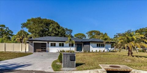 Photo of 13495 Oval Drive E, Largo, FL 33774 (MLS # TB8452840)