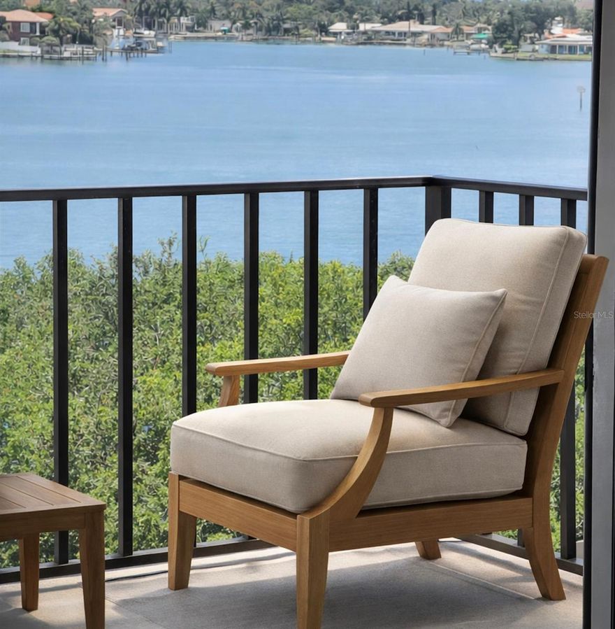 One or more photo(s) has been virtually staged. Perched above the shimmering waters of Boca Ciega Bay, 7050 Sunset Drive South #601 presents an exceptional opportunity to own a refined coastal residence where luxury, light, and lifestyle converge. Positioned as a corner end unit, natural light pours in from multiple exposures, enhancing the already breathtaking panoramic water views and vibrant sunsets that define true Florida waterfront living. The thoughtfully designed interior features luxury vinyl plank flooring (2021) throughout, creating a warm, modern foundation for the open-concept living and dining spaces. Expansive windows frame postcard-worthy views while seamlessly connecting indoor living to the private balcony—ideal for morning coffee, evening cocktails, or simply watching boats glide across the bay. The kitchen is both stylish and functional, outfitted with Whirlpool and Samsung appliances (2021), including a sleek range and refrigerator/freezer, complemented by generous cabinetry and updated lighting fixtures. Recent upgrades provide peace of mind and efficiency, including a new electrical panel (2020), HVAC system (2024), and Rheem water heater (2024). The primary suite offers a serene retreat with tranquil water views and an updated ensuite bath featuring modern vanities (2021). Additional bedrooms provide flexible space for guests, a home office, or a private den, all benefiting from the elevated natural light that only a corner residence can provide. Ceiling fans and designer lighting (2021) enhance comfort and ambiance throughout, while the in unit GE washer and dryer (2021) add everyday convenience. Residents enjoy the security and serenity of a waterfront community just minutes from the Gulf beaches, vibrant dining, and the cultural energy of downtown St. Petersburg. Resort-style amenities include a waterfront heated pool, hot tub, fitness center, sauna, steam room, outdoor grills, a bike rack, a party room with a kitchen, a library, a recreation room with a billiard table, ping pong table, and shuffleboard, and a kayak launch for easy access to all of Tampa Bay. Whether as a full-time residence or a sophisticated coastal escape, this exceptional end-unit home delivers effortless luxury, modern upgrades, and the unmatched beauty of sunset views over the bay. Wake up to water views. End every day with a sunset. Live where others vacation. Call today for a private showing!