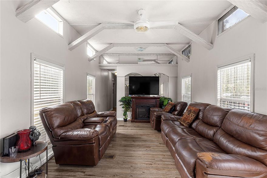 More pictures coming soon!- Welcome to this comfortable 3-bedroom, 2-bath mobile home on nearly half an acre, fully fenced for privacy and pets. A ramp leads to the front door for easy access, and a front deck offers a nice spot to relax. The property includes young fruit trees that haven’t produced yet, giving you room to grow your own outdoor space. Located close to the popular Santos Trail, this home offers great value with plenty of room and convenience.