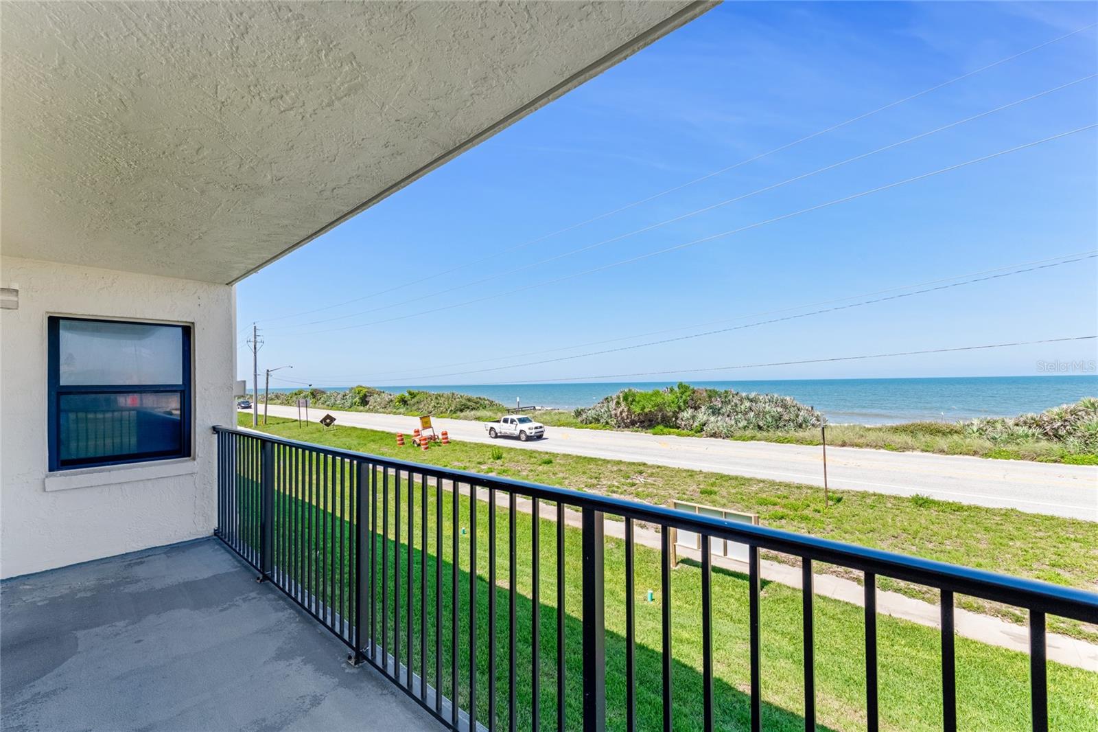 This beautiful second-story, end-unit condo offers amazing ocean views and convenient elevator access. It comes completely furnished with a stacked washer and dryer, so all you need to bring are your clothes! The beach and Atlantic Ocean are just minutes from your front door. This unit won't last long, so act fast