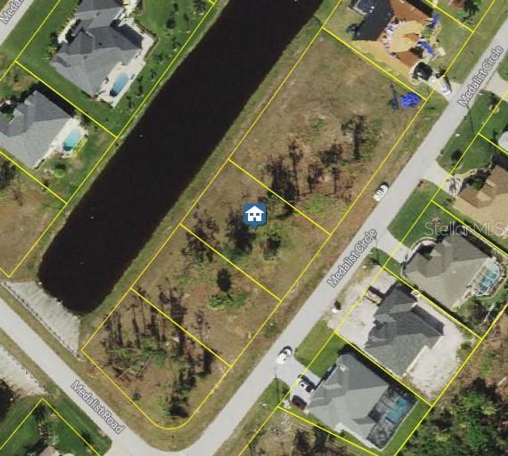 Photo of 5 Medalist Circle, Rotonda West, FL 33947 (MLS # D6144215)