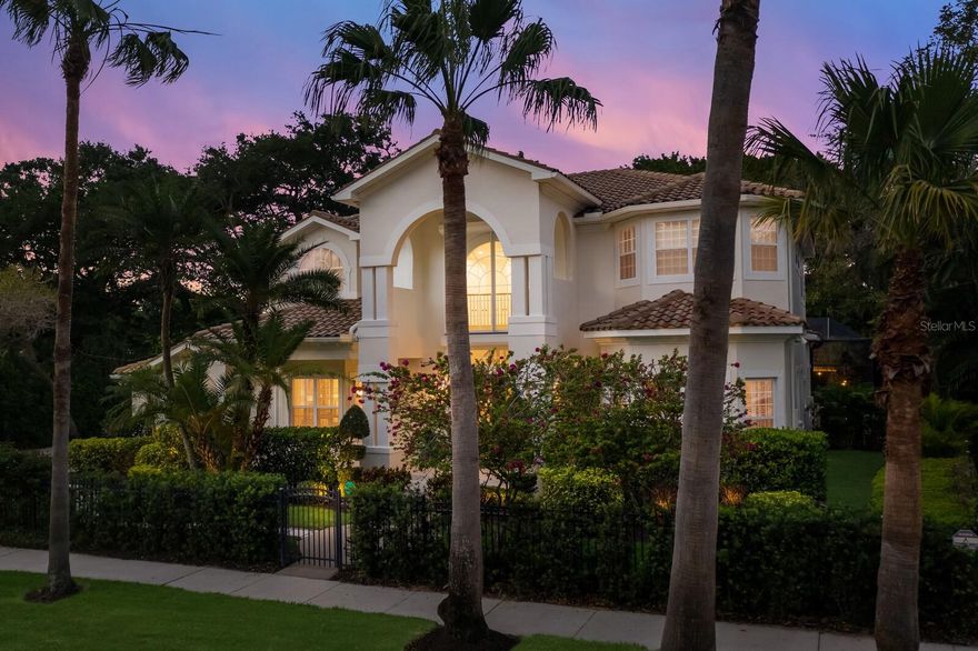 Under contract-accepting backup offers. Opulent architectural details, an impressive wrought iron floating split staircase, and 23 foot ceilings are just a few of the high-end touches that immerse you as you enter this show stopping, 6 bedroom property.  Located in the historic and reputable McClellan Park neighborhood, situated West of the Trail in sunny Sarasota, you are just steps away from the Southside Village, Downtown Sarasota and the sparkling waters of Sarasota Bay.  The open concept living lends itself to endless hours of entertaining.  The main floor offers the flexibility of formal entertaining in the dedicated Dining Room and Living Room spaces, while the Great Room offers a more casual evening with friends and family that spill over to the outdoor oasis where you will find a heated saltwater pool & spa, custom gazebo, fire pit, and covered seating area. No detail has been left untouched from the gleaming large porcelain tile floors, exquisite trim casings and cove ceilings, decorative light fixtures and high-end finishes to the perfectly manicured lawn and landscape.  This property is truly the definition of Fine Luxury Living in Paradise.