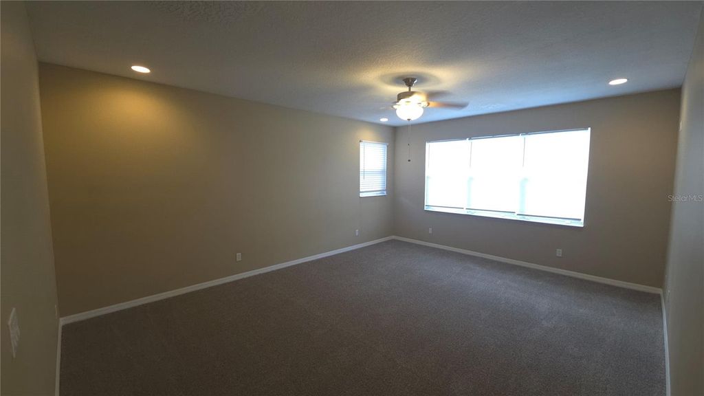 Photo of 3454 Loggerhead Way, Wesley Chapel, FL 33544 (MLS # O6366992)