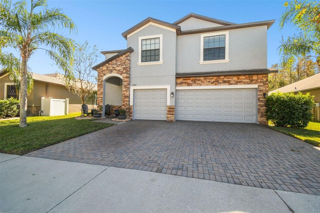 Photo of 12660 Mountain Springs Place, New Port Richey, FL 34655 (MLS # TB8325496)