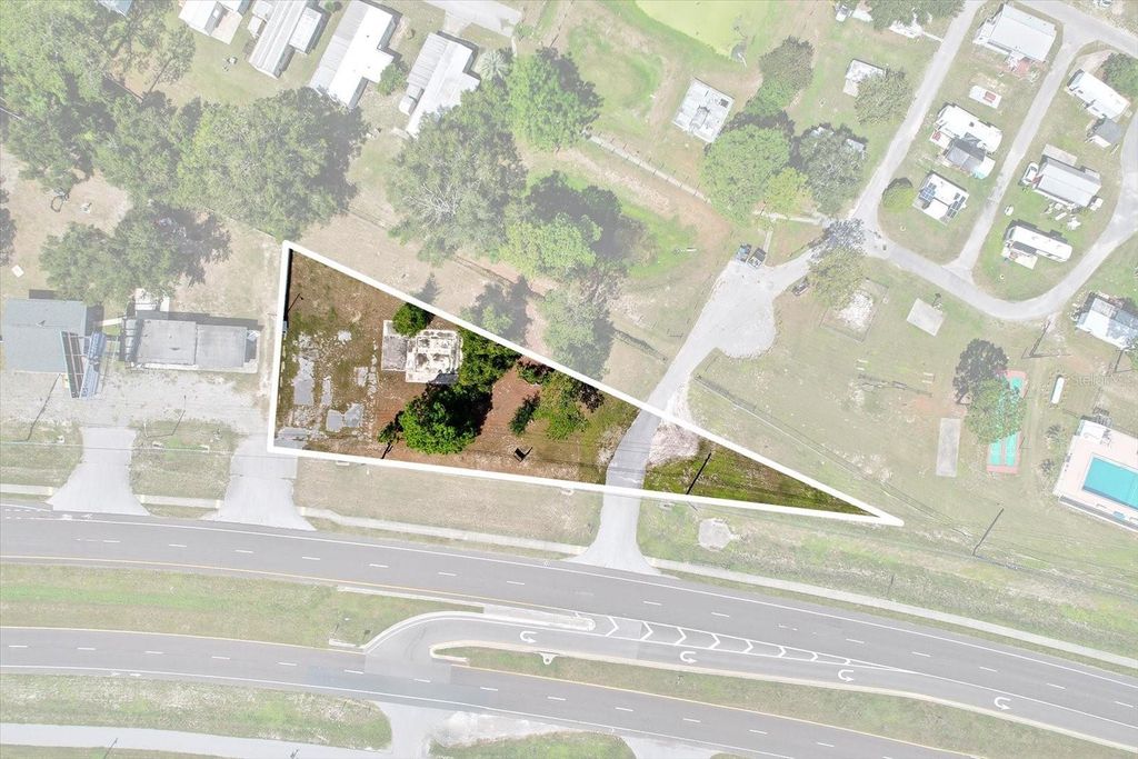 Photo of 15541 Cortez Boulevard, Brooksville, FL 34613 (MLS # TB8437390)
