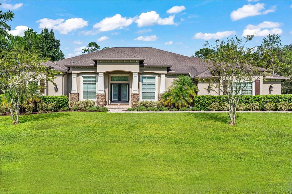 Photo of 8224 Spring Forest Lane, Wesley Chapel, FL 33544 (MLS # T3468115)