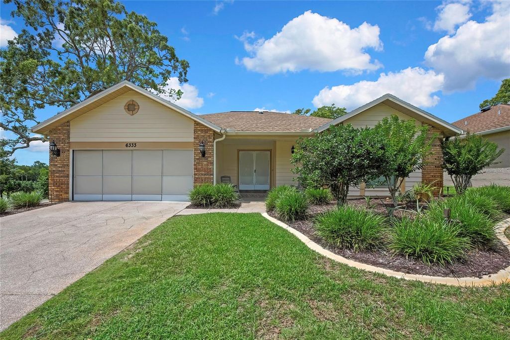 Photo of 6333 Pine Meadows Drive, Spring Hill, FL 34606 (MLS # TB8519633)