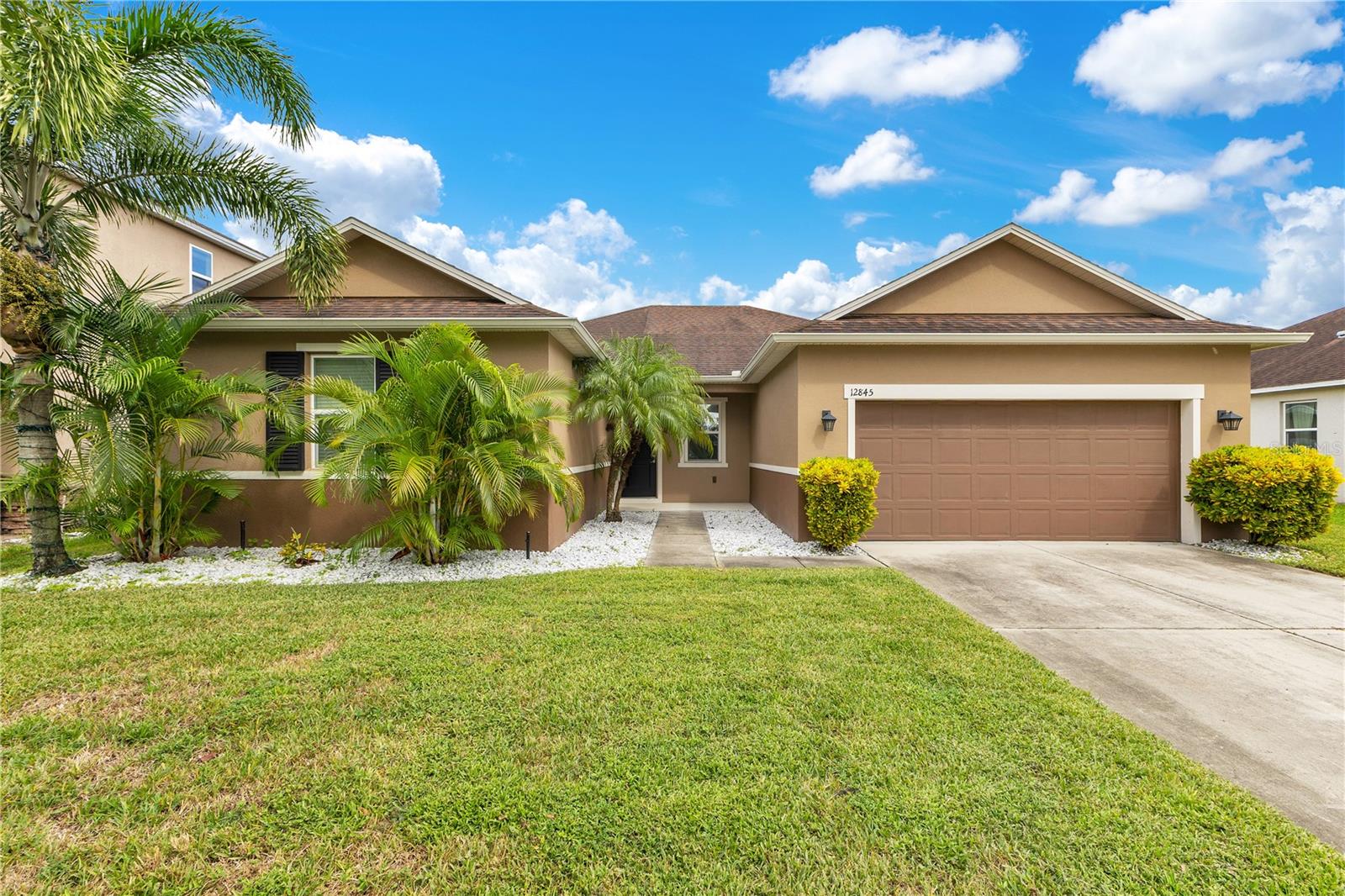 RENNOVATED, UPGRADED with WATER VIEW and FENCED BACK YARD. This BEAUTIFUL DESIGNER HOME Has Manny UPGRADES Some of Which Include: DESIGNER KITCHEN - NEW APPLIANCES, PENDANT LIGHTING, SHAKER CABINETS. NEW LUXURY PLANK FLOORING, NEW PAINT. DESIREABLE SAWGRASS PLANTATION is located in unincorporated Orange County which equates to lower property taxes (NO CDD). Community clubhouse, pool, playground and mailboxes conveniently LOCATED LESS THAN ONE BLOCK walking distance. There are walking trails, additional parks, tennis and basketball courts, and soccer fields along with nearby dog-parks. Schools, gas stations and shopping nearby. Central location to all that Orlando has nearby, including theme parks, and nearby transportation systems, such as SunRail, Brightline and Orlando International Airport.