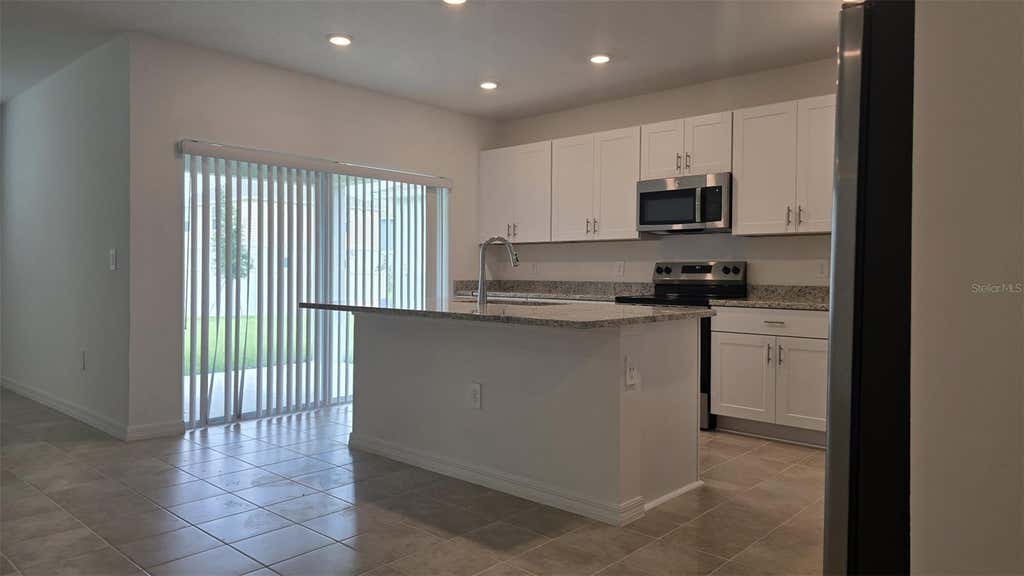 Photo of 4759 Cloister Street, Kissimmee, FL 34758 (MLS # O6433108)