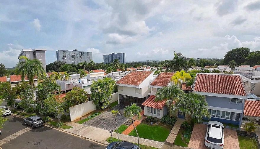 Stunning 2-story, 4-bed, 4 full bath home in the gated Villas de San Francisco. Features a 2-car garage, granite kitchen, living & family rooms, and dining area. Enjoy the wood roof terrace, patio, and in-ground pool — perfect for family living and entertaining.

Located just 9 miles from San Juan Airport, 4 miles from Plaza Las Americas, and 3 miles from private schools. Quiet, secure, and ready to move in!