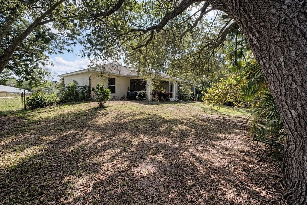 Photo of 720 Brannen Avenue, Lehigh Acres, FL 33974 (MLS # C7523597)