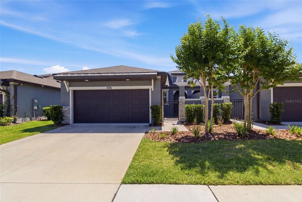 Photo of 219 Villa Luna Lane, Lutz, FL 33549 (MLS # TB8506310)