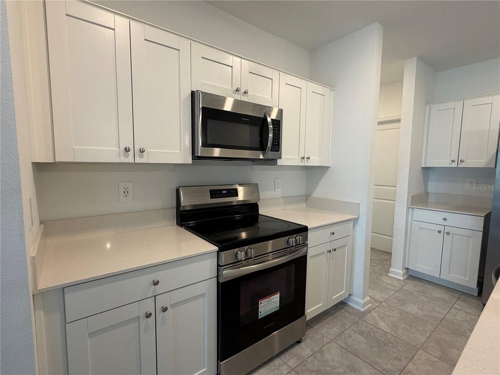 Photo of 537 Sea Turtle Lane, Haines City, FL 33844 (MLS # O6449583)