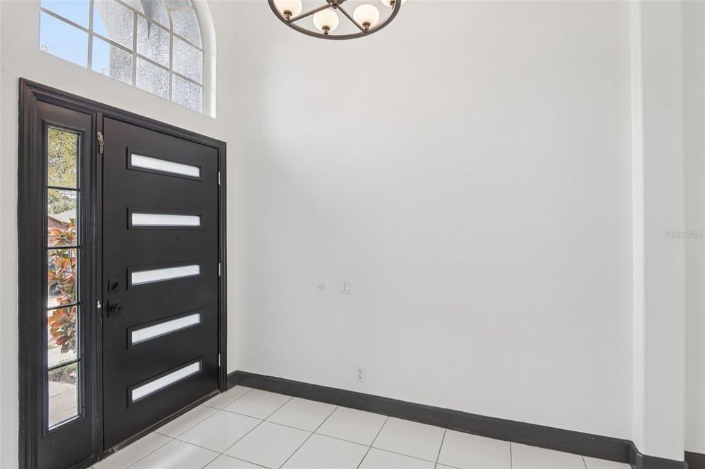 Photo of 1266 Paradise Lake Drive, Tarpon Springs, FL 34689 (MLS # TB8409612)