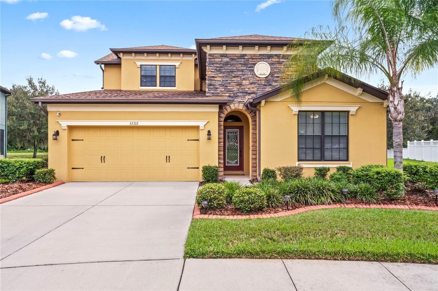 ***PRICE REDUCED AND SELLER IS OFFERING $7,500 FOR BUYER'S CLOSING COSTS OR RATE BUY DOWN*** Welcome Home to this beautiful residence located on an oversized lot, with stunning pond and conservation views, in the gated village of Glenbrook in Watergrass! From the moment you walk in you will notice the build quality and attention to detail this Standard Pacific Home has including crown molding throughout and coffered ceilings in the dining room as well as primary bedroom. The first floor includes the foyer, two secondary bedrooms with a shared bathroom, laundry room, formal dining room which can easily convert to an office or play room, spacious owners suite with spa like bathroom and the open concept living room, kitchen and eat in dining space. The large kitchen has dark wood cabinets, granite countertops, a pantry, a large island and stainless appliances including a cooktop, microwave, double oven, dishwasher and fridge. Upstairs offers a large loft as well as a nicely sized bedroom and full bathroom. There is NO carpet in this home which makes cleaning a breeze and is allergy friendly. Off the living room you will find a large screened and pavered patio that is the perfect place to entertain or relax and watch the wildlife including birds, deer and turtles. The sellers are offering a 1 year home warranty for your peace of mind. Watergrass is a beautifully landscaped, master planned community located in the growing and desirable town Wesley Chapel. The neighborhood amenities include The Watergrass Club which has an Olympic lap pool, resort pool, 2 tennis courts, gym, and meeting space. Promenade Park also offers a nice community pool, dog park, playground, and pavilion. Additionally, Glenbrook village has its very own playground and basketball court. This home is zoned for Watergrass Elementary which is located inside the neighborhood, Weightman Middle School and Wesley Chapel High School which are minutes away. Also, just outside of Watergrass you have excellent Charter School options including Academy at the Farm, Innovation Preparatory Academy (K-8) and Kirkland Ranch Academy of Innovation (high school, but soon to be K-12). Pasco Hernando State College, St. Leo University, University of South Florida and University of Tampa are all within a short drive. This tranquil community is close to Krate at the Grove, Tampa Premium Outlets and Wiregrass Mall meaning some of Tampa’s best shopping and restaurants are within 15 minutes from home. There is a brand new Publix plaza, daycare and Starbucks that are almost completed at the entrance of Watergrass which will be incredibly convenient. Thanks to the overpass exit on I-75, it’s an easy drive to downtown Tampa, Tampa International Airport and the area’s beautiful beaches. And when you are looking for excitement, the Epperson Crystal Lagoon, B&B Movie Theater, Advent Health Center Ice Rink, Main Event, Urban Air Trampoline Park, Busch Gardens and Adventure Island are all very close by. If you are looking for a beautiful home in a serene, friendly neighborhood close to every convenience, this is it. No need to look further, schedule your private showing today!