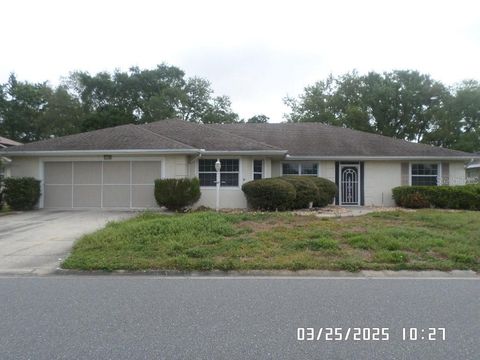 Photo of 21708 Royal St Georges Lane, Leesburg, FL 34748 (MLS # O6300297)