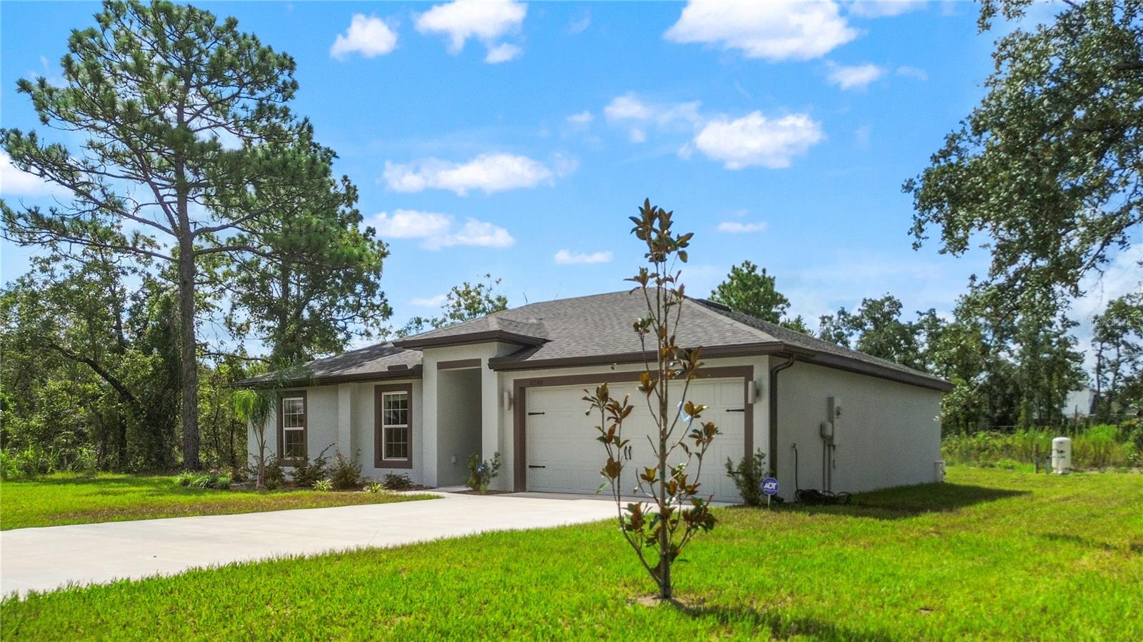 Dream Home on Half an Acre in Weeki Wachee Springs! This modern 2024 Vero floor plan by LGI Homes features stainless-steel energy-efficient appliances, granite countertops, and an open layout perfect for entertaining. The luxurious master suite boasts a stunning walk-in closet, while the spacious half-acre backyard offers room for a pool, RV parking, and endless outdoor fun. Complete with a two-car garage and lush landscaping, this solid block home is located in a non-flood zone, so no flood insurance is required! Move-in ready and full of value! One or more photo(s) has been virtually staged.