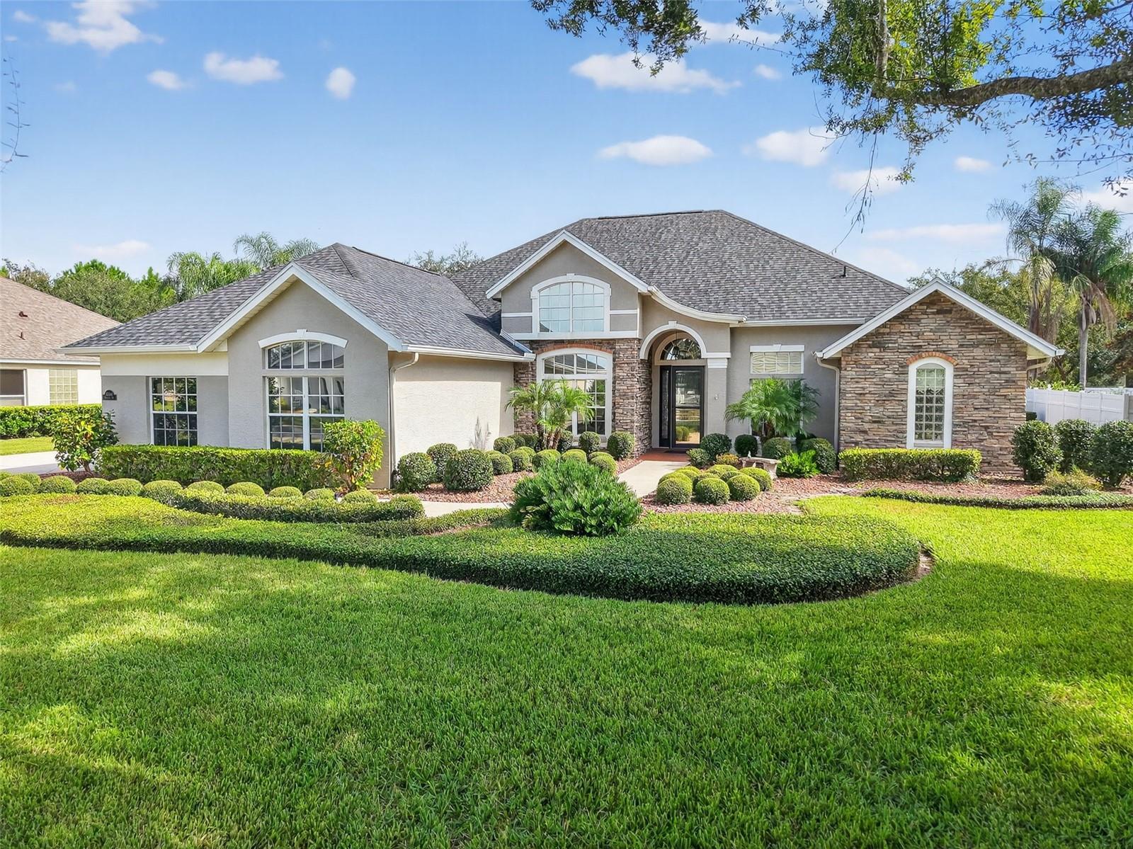 This move-in ready, custom-built 3 bedroom, 2.5 bath pool home is located in the desirable Park Place community, offering the perfect combination of comfort, style, and Florida living! Recently updated with a brand-new roof (Sept. 2025) and a 5-year-old HVAC system and water heater, this home is ready for worry-free ownership and easy homeowner’s insurance approval.
The open-concept kitchen is perfect for entertaining and features granite countertops, walk-in pantry, stainless steel appliances, a breakfast nook, dry bar, soft-close drawers, a center island with extra outlets, and a breakfast bar for additional seating. The kitchen, family room, living room, and primary suite all showcase beautiful views of the screened-in pool area, creating seamless indoor-outdoor living. The pool enclosure has been recently updated with fresh paint and brand-new screening, so you can enjoy it for years to come.
Relax in the spacious family room, complete with a cozy gas fireplace and custom built-ins. The primary suite is privately tucked away and features French doors, a large walk-in closet customized by The Closet Monkey, and a spa-like ensuite bath with a garden tub and walk-in shower.
Additional highlights include an indoor laundry room with cabinets and a deep sink, plus a 2-car garage AND separate golf cart garage with overhead storage. The outdoor area is ideal for Florida poolside living, offering plenty of space for dining, lounging, and entertaining, along with a convenient half bath off the lanai. Park Place has a community irrigation well, making it a HUGE savings for all residents,
As a resident of Park Place, you’ll enjoy private access to Lake Joanna, complete with a resident-only dock and boat ramp, perfect for boating, kayaking, paddleboarding, fishing, or simply soaking in the lake views. All of this is just minutes from downtown Mount Dora and Eustis, where you can enjoy shopping, dining, festivals, and live entertainment.
This home has everything you need to enjoy the Florida lifestyle—schedule your private showing today!