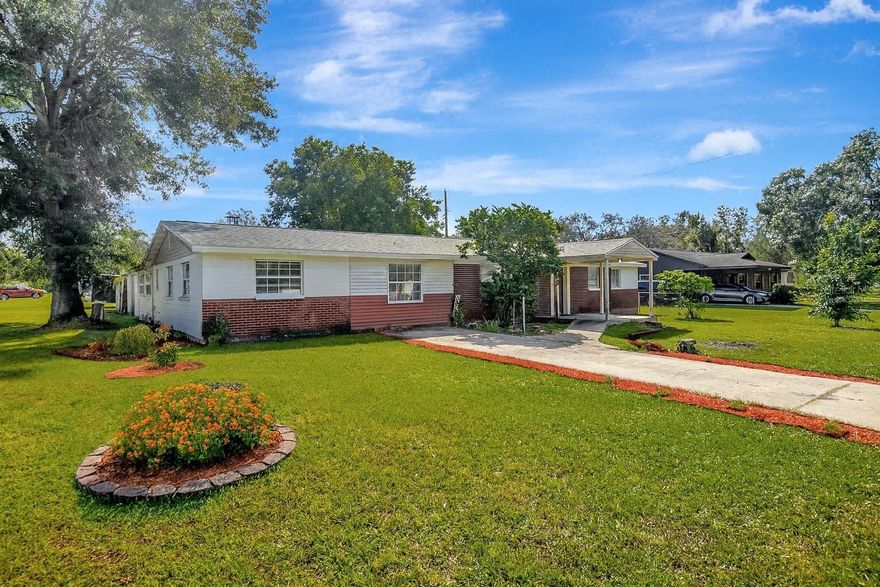One or more photo(s) has been virtually staged. Equity-building opportunity near USF and Moffitt Cancer Center! This spacious 5-bedroom, 3-bath home sits on a huge corner lot and offers over 2,100 sq ft of living space. Built with solid block construction and featuring a newer roof (2021), this home has the essentials covered and is ready for your finishing touches.

The flexible layout provides options for a mother-in-law suite or multi-family setup, while additional highlights include a fireplace, ample parking, and no HOA.

Conveniently located near USF, Moffitt, Busch Gardens, shopping, and dining—with the new USF Football Stadium opening Fall 2027 to boost growth and rental demand—this property is a smart choice for buyers looking to add value and create instant equity.
