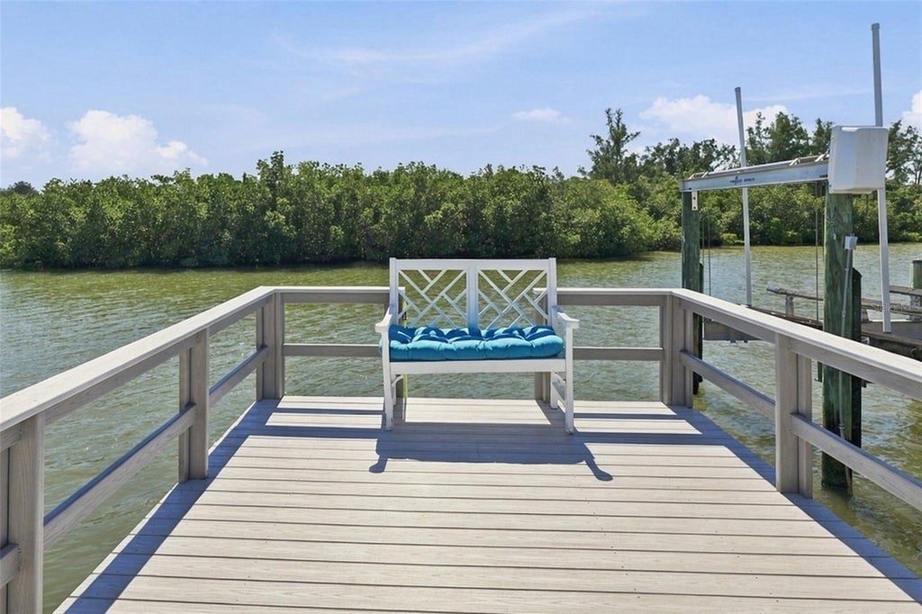 Photo of 452 Boca Ciega Point Boulevard S, St Petersburg, FL 33708 (MLS # TB8563183)