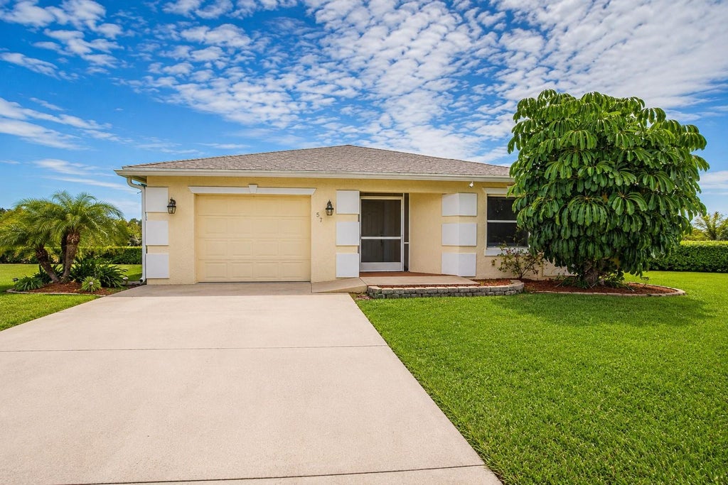 Photo of 57 Huarte Way, Port Saint Lucie, FL 34952 (MLS # O6428785)