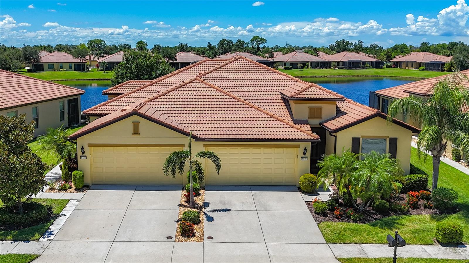 One or more photo(s) has been virtually staged. One ore more of the photos has been virtually staged. IF YOU ARE READY TO START LIVING YOUR BEST FLORIDA LIFESTYLE HAVE I GOT A HOME FOR YOU...This gorgeous VILLA has 2 bedrooms, 2 full baths, a large great room with an area for dining, plus an extra room with double FRENCH DOORS & A WINDOW that could be a den/office or what best meets your needs. The HUGE SCREENED LANAI overlooks a serene pond for outdoors relaxing or enjoying a COOKOUT WITH YOUR NEW SOUTHSHORE FRIENDS. The KITCHEN has upgraded stainless steel appliances, granite countertop and a closet pantry. Inside laundry room has a top of the line washer and dryer that also stay with the home.
SOUTHSHORE FALLS is a 24 HOUR GATED RESORT STYLE COMMUNITY. You will meet GREAT NEIGHBORS & enjoy a REAL SENSE OF COMMUNITY in this DEL WEBB ACTIVE COMMUNITY! Don't miss out on the most popular Pickleball, Biking and Water Aerobics clubs! Here in SOUTHSHORE FALLS you will love the 14,000 sq.ft. CLUBHOUSE that brings ENTERTAINMENT, a STATE OF THE ART FITNESS CENTER, an ENDLESS COFFEE BAR, CRAFT/ART ROOM, BILLIARDS, LIBRARY, GRAND BALLROOM, SHUFFLE BOARD, PUTTING RANGE, FANTASTIC LAGOON POOL, HOT TUB, FIREPIT/CONVERSATION AREA, BOCCE BALL & HORSESHOES! HUGE VARIETY OF CLUBS & SPECIAL INTEREST GROUPS available 7 days a week! PROFESSIONAL MANAGEMENT STAFF & FULL TIME LIFESTYLE DIRECTOR! You will love the great ENTERTAINMENT GROUPS, TRIBUTE SHOWS (Eagles, Foreigner, Neil Diamond, Elvis to name a few), COMEDY SHOWS, EDUCATIONAL WORKSHOPS & SEMINARS, HOLIDAY ENTERTAINMENT & much more! Walking trails are throughout the community & a GAZEBO is the perfect spot to enjoy AMAZING SUNSETS! SSF HAS A TOTAL OF 3 POOLS & A HOT TUB! You can be as busy as you want to be, or sit back and relax and enjoy the comfort of this gorgeous home. LOCATION, LOCATION, LOCATION! YOU WILL ENJOY AN easy commute into Tampa for SPORTS, ST PETE with MUSEUMS & ENTERTAINMENT, SARASOTA/BRADENTON for TOP FLORIDA BEACHES, and drive to FLORIDA'S FAMOUS THEME PARKS! DO NOT WAIT to check this listing & community out. Your BEST LIFE STARTS RIGHT HERE! Ask to see this FANTASTIC VILLA & COMMUNITY TODAY! **some of the photos are virtually staged**