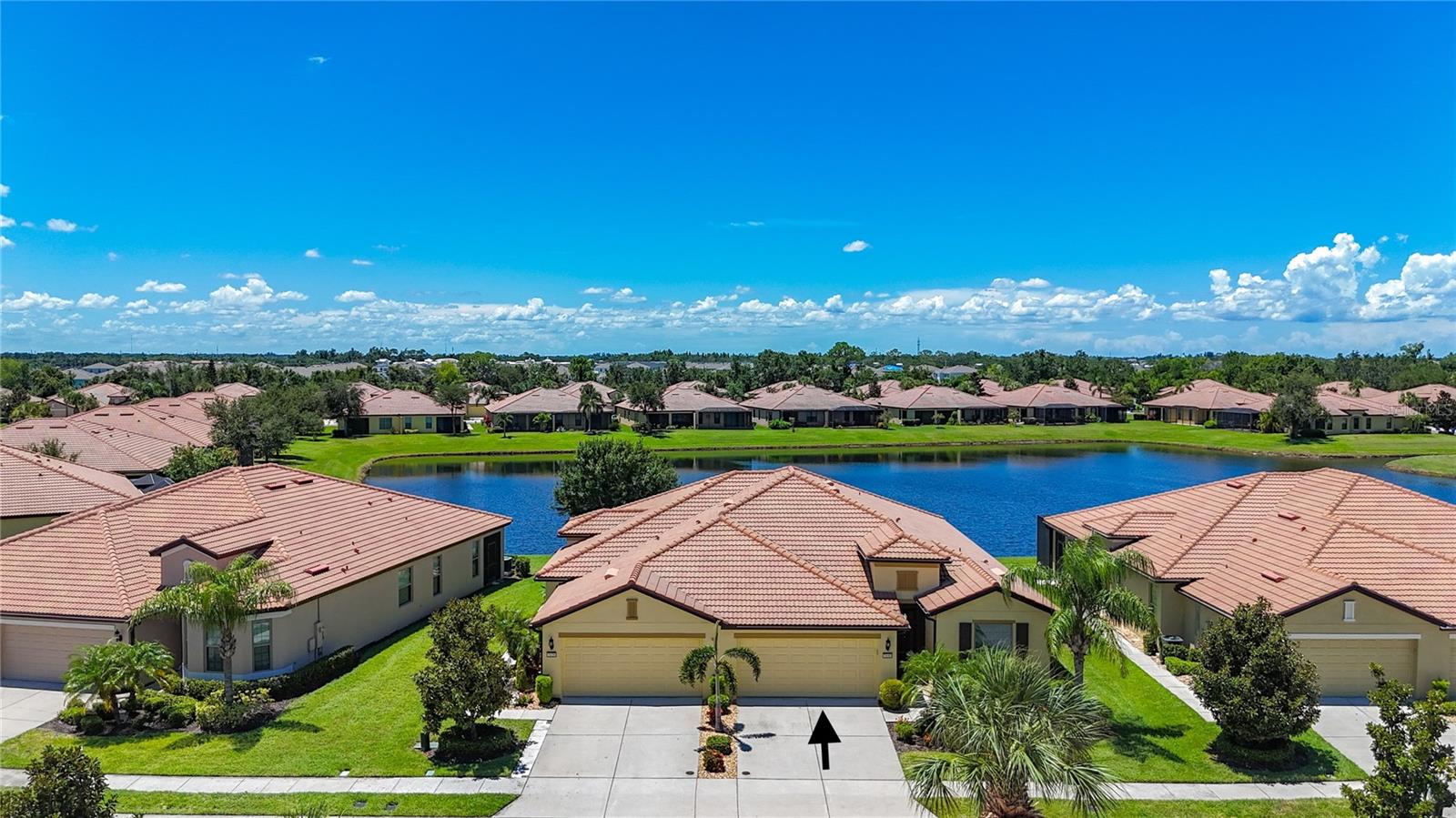 One or more photo(s) has been virtually staged. IF YOU ARE READY TO START LIVING YOUR BEST FLORIDA LIFESTYLE HAVE I GOT A HOME FOR YOU...This gorgeous VILLA has 2 bedrooms, 2 full baths, a large great room with an area for dining, plus an extra room with double FRENCH DOORS & A WINDOW that could be a den/office or what best meets your needs. The HUGE SCREENED LANAI overlooks a serene pond for outdoors relaxing or enjoying a COOKOUT WITH YOUR NEW SOUTHSHORE FRIENDS. The KITCHEN has upgraded stainless steel appliances, granite countertop and a closet pantry. Inside laundry room has a top of the line washer and dryer that also stay with the home.
SOUTHSHORE FALLS is a 24 HOUR GATED RESORT STYLE COMMUNITY. You will meet GREAT NEIGHBORS & enjoy a REAL SENSE OF COMMUNITY in this DEL WEBB ACTIVE COMMUNITY! Don't miss out on the most popular Pickleball, Biking and Water Aerobics clubs! Here in SOUTHSHORE FALLS you will love the 14,000 sq.ft. CLUBHOUSE that brings ENTERTAINMENT, a STATE OF THE ART FITNESS CENTER, an ENDLESS COFFEE BAR, CRAFT/ART ROOM, BILLIARDS, LIBRARY, GRAND BALLROOM, SHUFFLE BOARD, PUTTING RANGE, FANTASTIC LAGOON POOL, HOT TUB, FIREPIT/CONVERSATION AREA, BOCCE BALL & HORSESHOES! HUGE VARIETY OF CLUBS & SPECIAL INTEREST GROUPS available 7 days a week! PROFESSIONAL MANAGEMENT STAFF & FULL TIME LIFESTYLE DIRECTOR! You will love the great ENTERTAINMENT GROUPS, TRIBUTE SHOWS (Eagles, Foreigner, Neil Diamond, Elvis to name a few), COMEDY SHOWS, EDUCATIONAL WORKSHOPS & SEMINARS, HOLIDAY ENTERTAINMENT & much more! Walking trails are throughout the community & a GAZEBO is the perfect spot to enjoy AMAZING SUNSETS! SSF HAS A TOTAL OF 3 POOLS & A HOT TUB! You can be as busy as you want to be, or sit back and relax and enjoy the comfort of this gorgeous home. LOCATION, LOCATION, LOCATION! YOU WILL ENJOY AN easy commute into Tampa for SPORTS, ST PETE with MUSEUMS & ENTERTAINMENT, SARASOTA/BRADENTON for TOP FLORIDA BEACHES, and drive to FLORIDA'S FAMOUS THEME PARKS! DO NOT WAIT to check this listing & community out. Your BEST LIFE STARTS RIGHT HERE! Ask to see this FANTASTIC VILLA & COMMUNITY TODAY! **some of the photos are virtually staged**