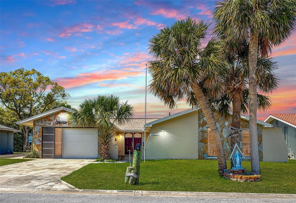 Photo of 9903 San Mateo Way, Port Richey, FL 34668 (MLS # TB8490786)