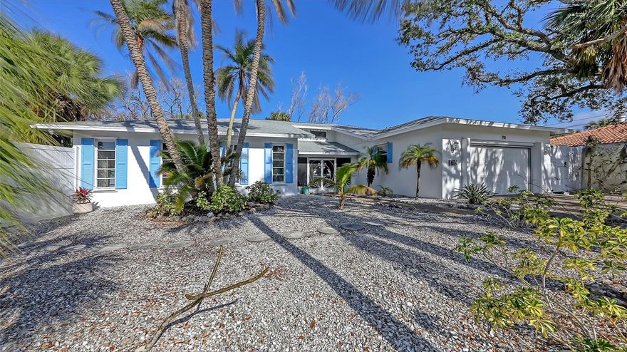 Island living at it's best. Just a short distance to world famous Siesta Key Beach. This home has had NO flood damage inside the home or garage areas. Custom built by Schrock home builders. Featuring 3 bedrooms, den/office & 2 1/2 baths. Over 2500 sq. ft. under air with an over sized 2 car garage with screen. New roof just installed. Kitchen was remodeled with new cabinets, granite counters, Bosch dishwasher, Viking cooktop & Frigidaire double wall oven. Hurricane shutters throughout. Solar panels for the pool. This home shows light & bright with 4 skylights. A wall of glass doors leads to wood deck. Huge master suite has separate sitting area. Large screened pool with solar heat. Florida friendly landscaping for low maintenance. Located in the private community of Siesta Bayside Waterside South. This home has been professionally staged. Make this Island Oasis your own!