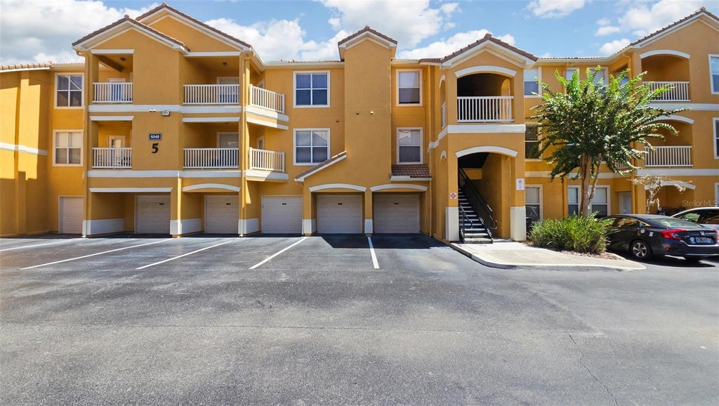 Photo of 8848 Villa View Circle #206, Orlando, FL 32821 (MLS # O6446623)
