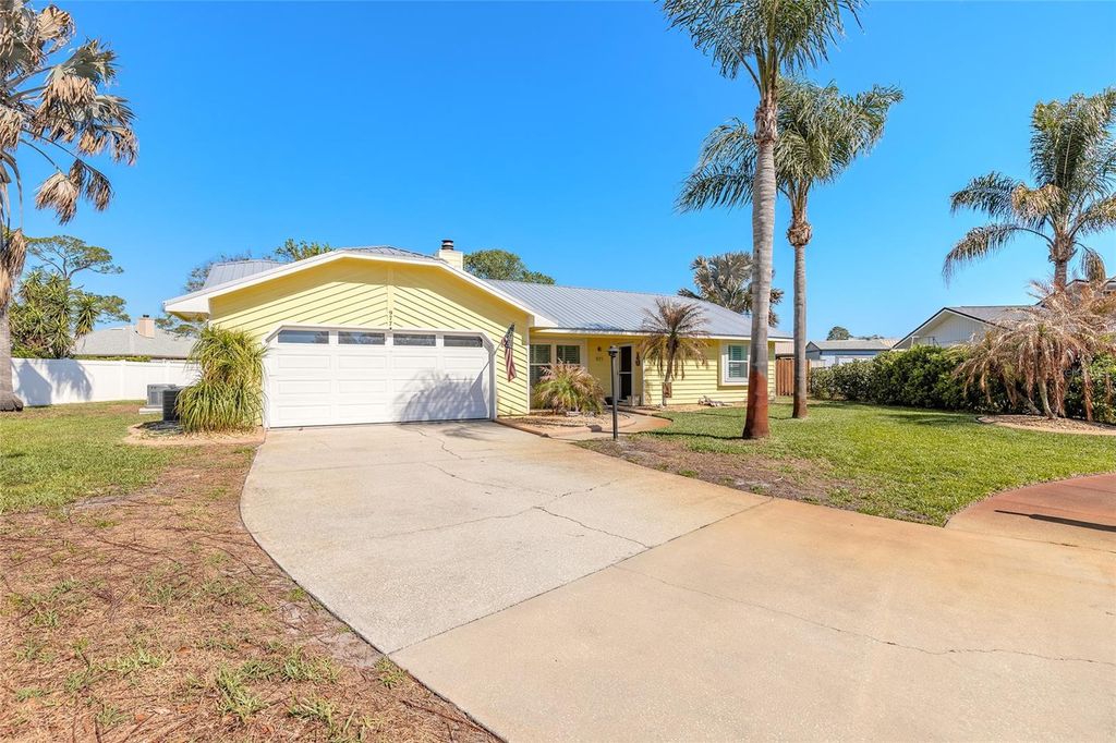 Photo of 977 Sand Crest Drive, Port Orange, FL 32127 (MLS # NS1087701)