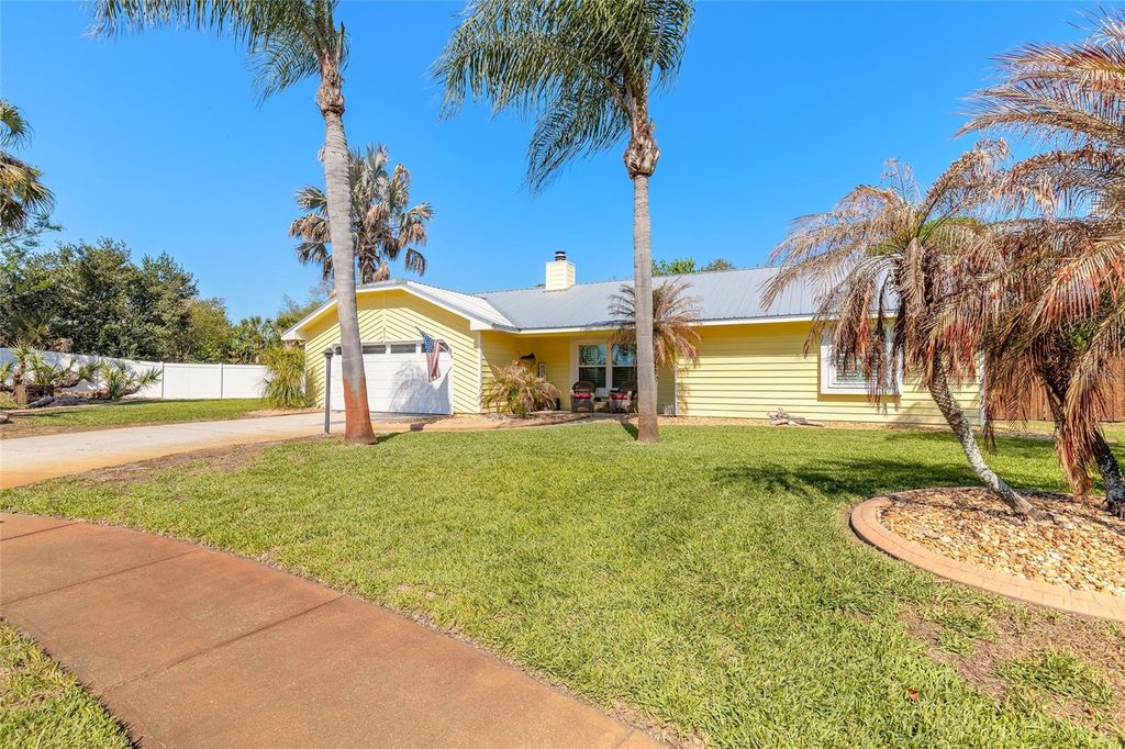 Photo of 977 Sand Crest Drive, Port Orange, FL 32127 (MLS # NS1087701)