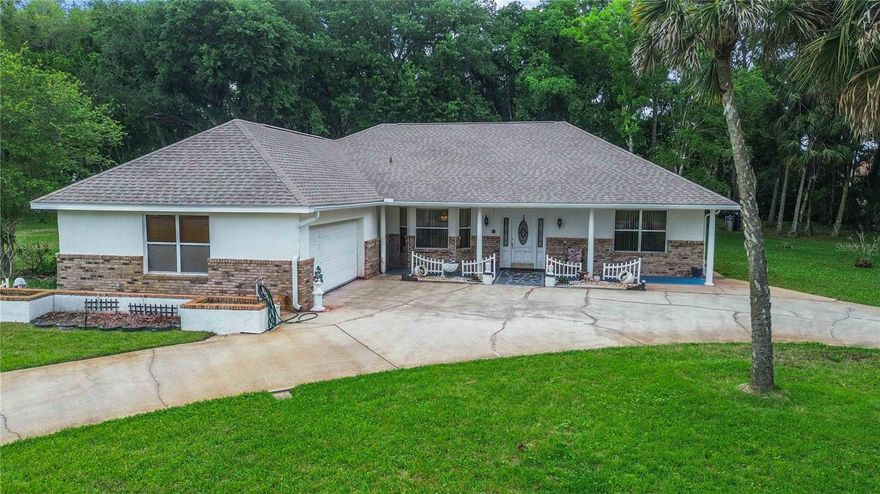 KIRKWOOD / CATHEDRAL ESTATES! One of TITUSVILLE'S Best Kept Secrets!! CUSTOM GENERATIONAL HOME offering In-Law Suite, equipped with an additional Fully Functional Kitchen (Range, Refrigerator, Sink and Wood Cabinets) Plus your own Private Side Entrance. Original Owner has spared no expense when designing this Beautiful One Story Estate on Over One Acre. 2510 Square Feet of Living Area. Inviting Entryway with Formal Dining Room, Huge Family/Living Room and an Electric Fireplace adding warmth and comfort to this special home. Extra Large Kitchen with plenty of counter and cabinet space overlooking the Good Morning Room and 15' x 30' Covered Screened Lanai. Split Floor Plan with Spacious Owner Suite, Featuring Spacious Walk-In Closet and Bath. Two additional bedrooms and a 4th Bedroom (currently used a guest suite) offers a range of spaces perfect for family and guest.Inside Laundry comes with Washer, Dryer, Sink and Freezer. Some additional features include Crown Molding, Trey Ceilings and French Doors throughout. 26' x 20' Two Car Garage with Work Bench PLUS plenty of extra parking on your Circular Driveway. The entire experience of this True Florida Home is revolution and close relationship with Nature. Cul-de-Sac lot is even better with very little traffic. Kirkwood is a walkable and friendly community conveniently located close to all Major Shopping and Restaurants. Easy access to HWY 50 and I-95. Watch the SPACE LAUNCHES from your own back yard or take a Quick Ride to the Beach!