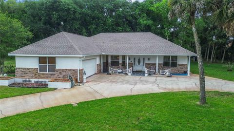 Photo of 2620 Toups Trail, Titusville, FL 32780 (MLS # O6398733)