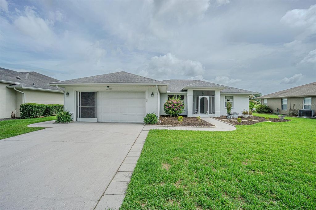 Photo of 10535 Moshie Lane, San Antonio, FL 33576 (MLS # TB8479860)
